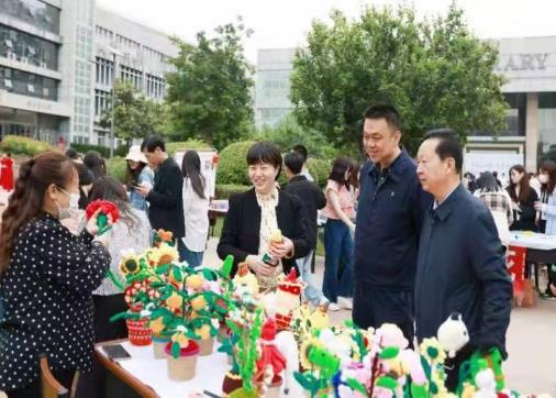 新密非遗文化走进郑州城市学院